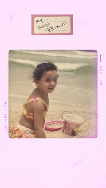 A childhood beach photograph in Fati’s pink archive frame
